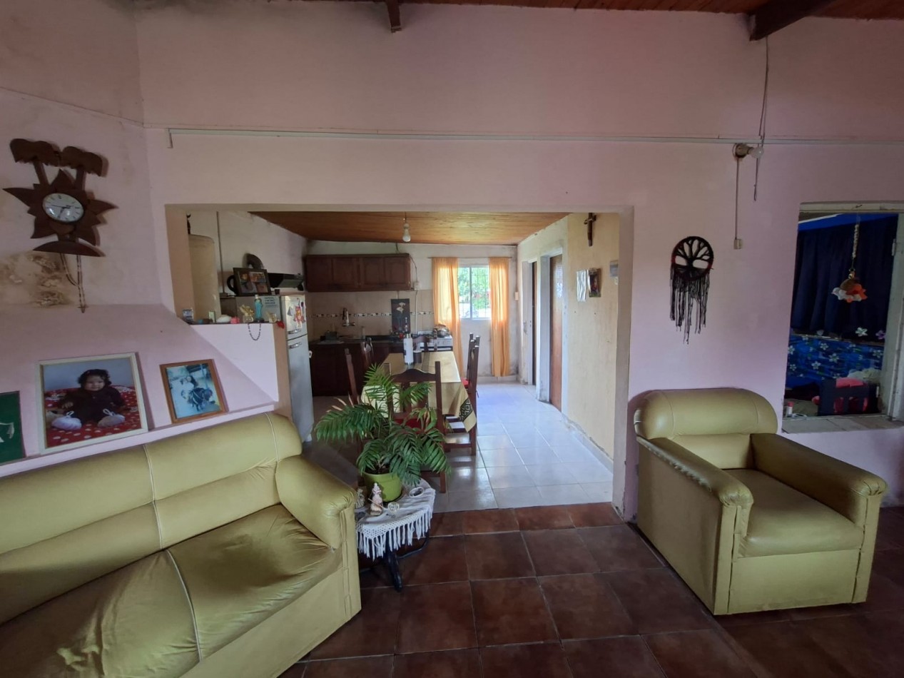 VENTA DE INMUEBLE CON LOCAL COMERCIAL- RUTA 11