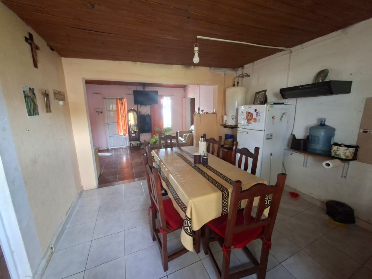 VENTA DE INMUEBLE CON LOCAL COMERCIAL- RUTA 11