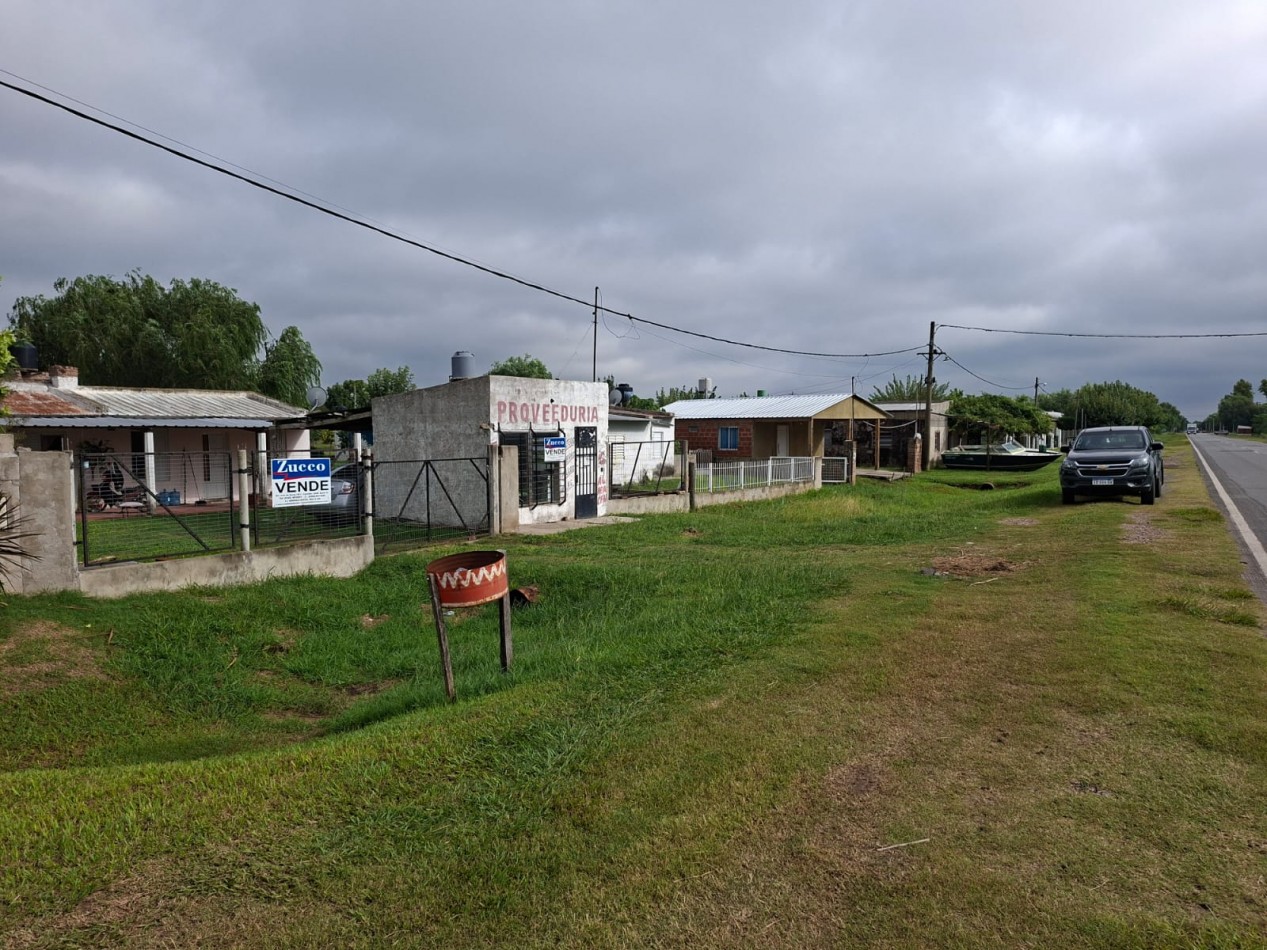 VENTA DE INMUEBLE CON LOCAL COMERCIAL- RUTA 11