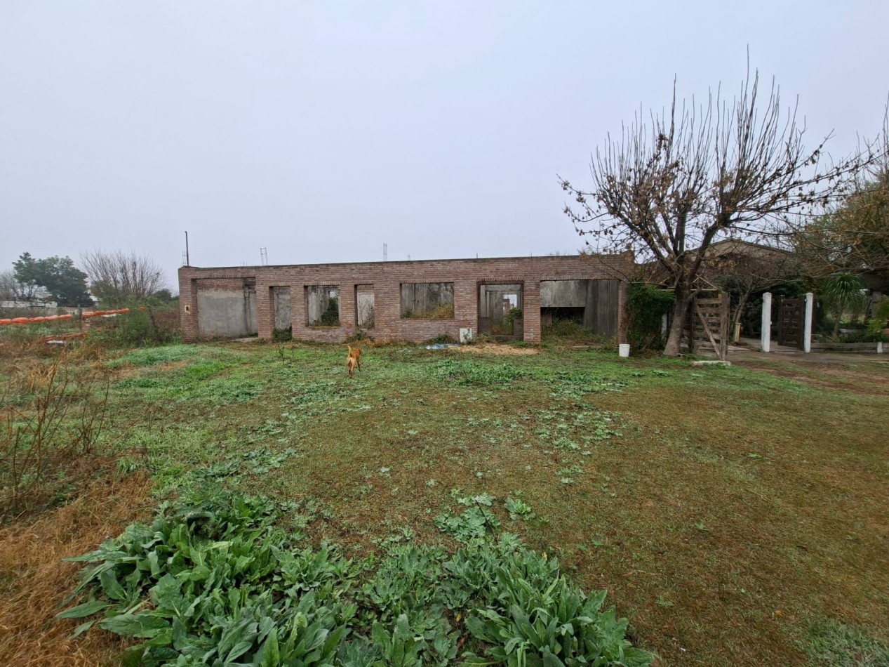VENTA DE LOTE CON CASA EN CONSTRUCCION