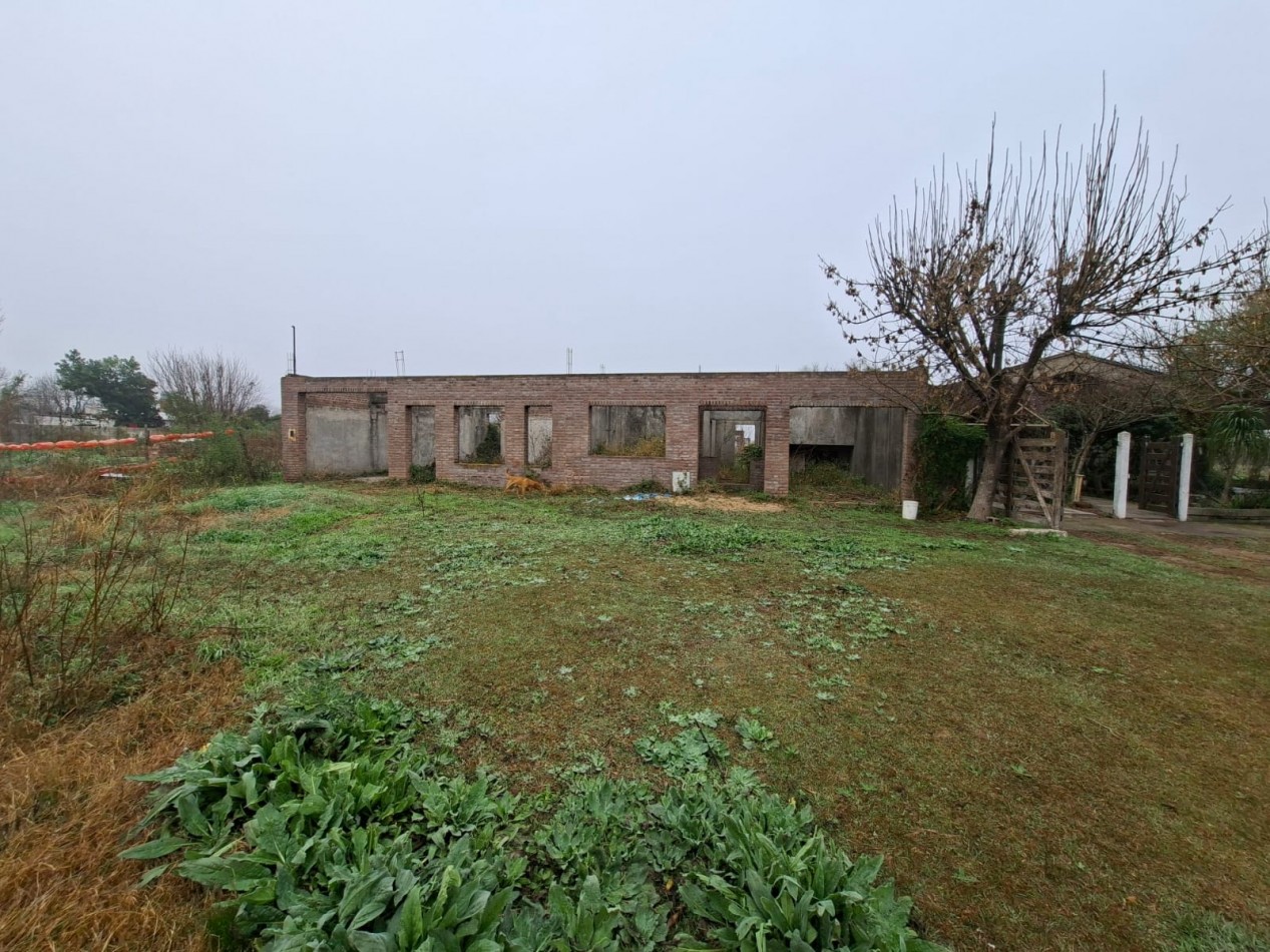 VENTA DE LOTE CON CASA EN CONSTRUCCION