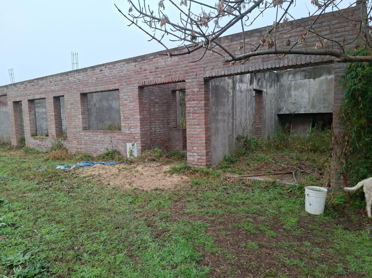 VENTA DE LOTE CON CASA EN CONSTRUCCION